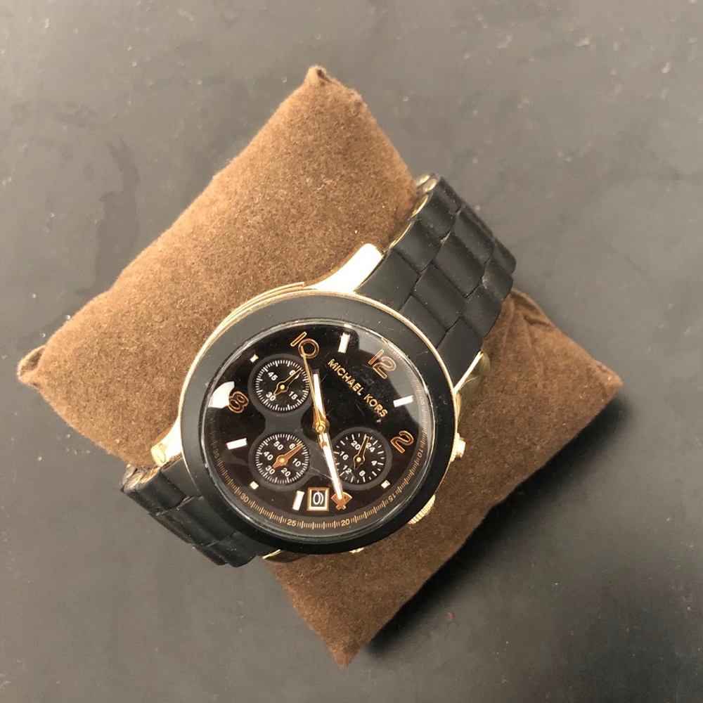 Black and gold Michael Kors watch